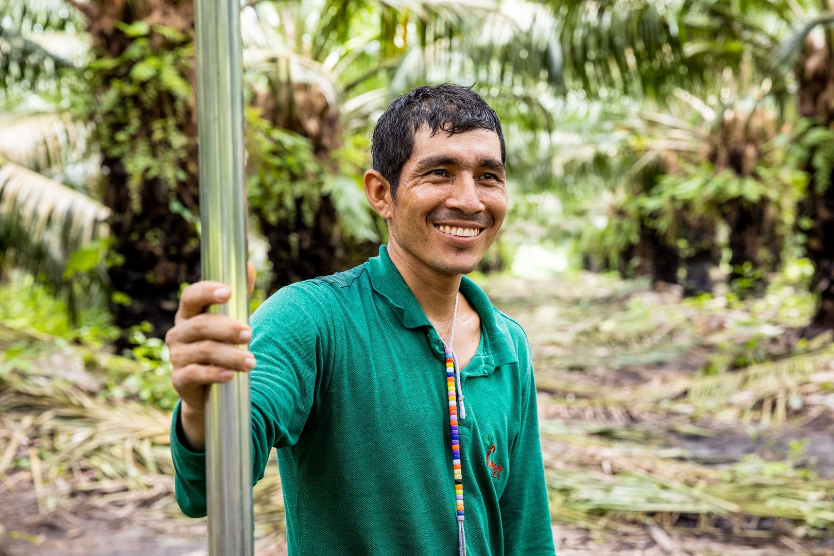 Person-smiling-in-a-jungle-min